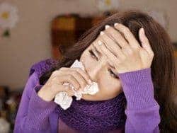 mujer con gripe